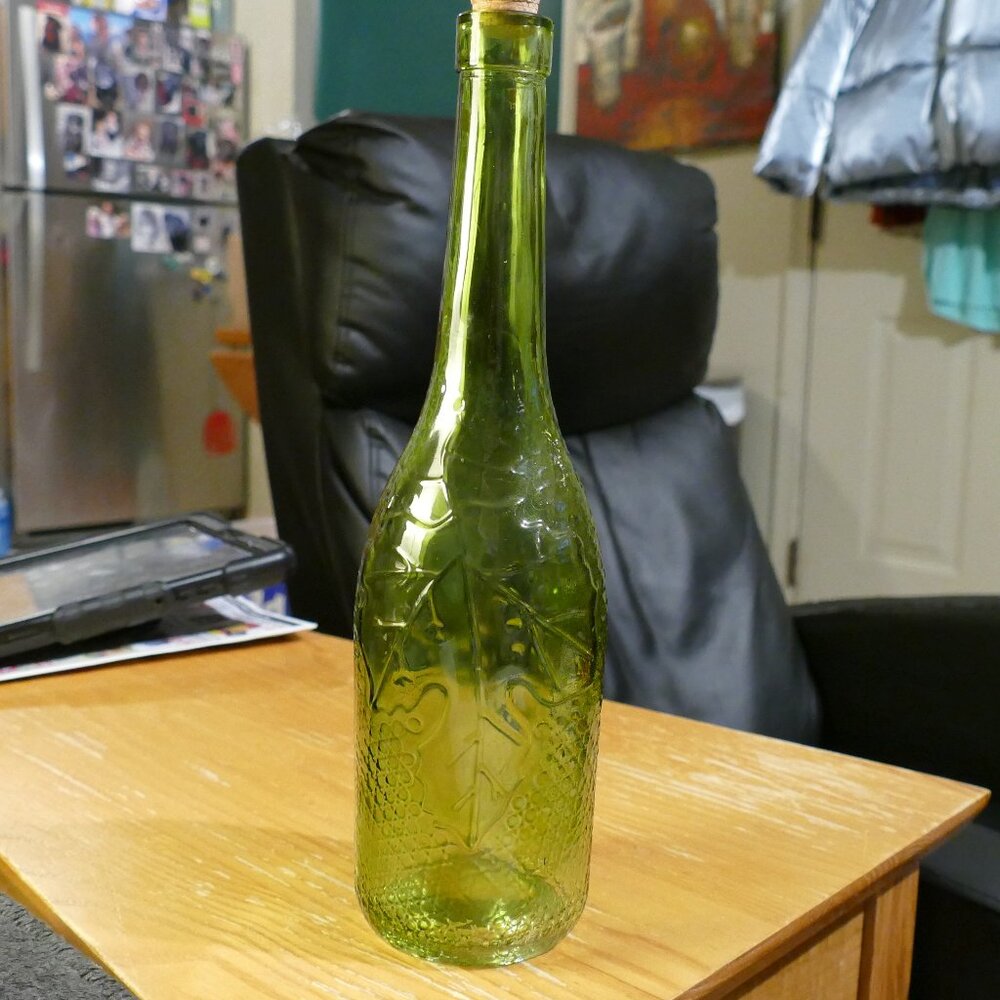 Holiday Round Green Glass Decorating Bottle With Raised Leaves Design
